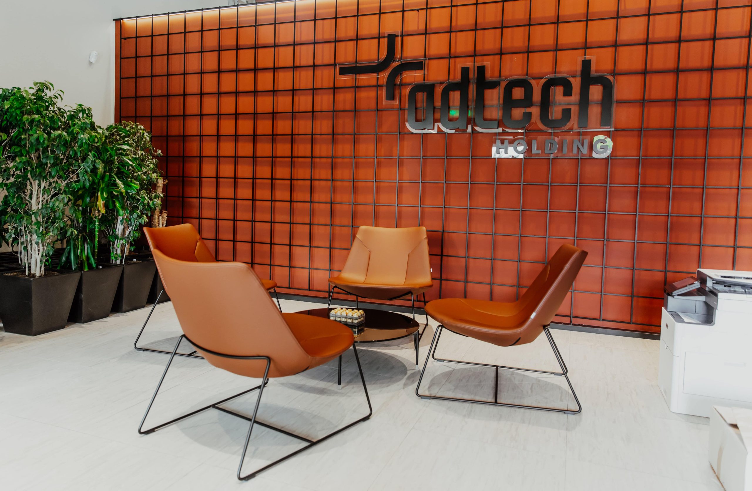 AdTech Holding new office
